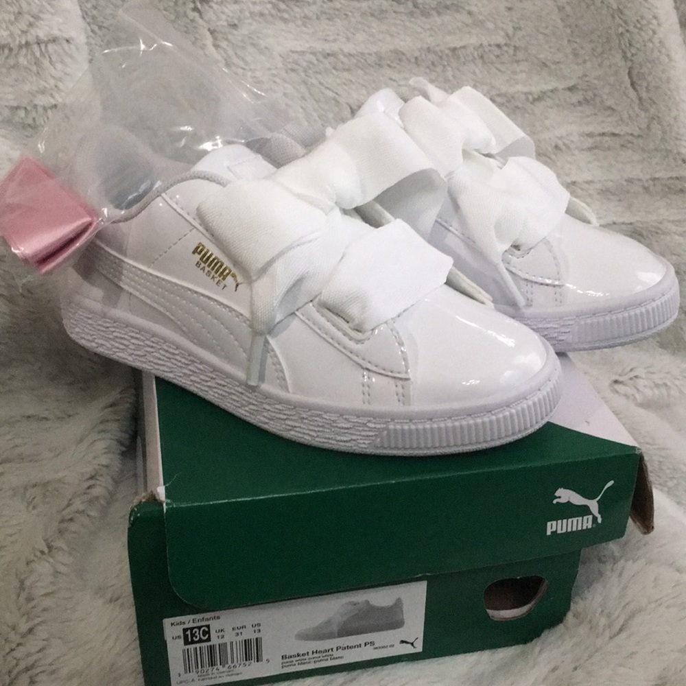 White patent girls Puma sneakers